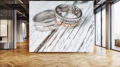 wedding rings on rustic wood Wall mural