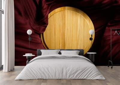 round wood combination on a red cloth background Wall mural