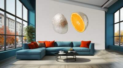 Sliced silver metallic orange fruit against gray background. Minimal cyberpunk or retro futurism fruit composition. Wall mural