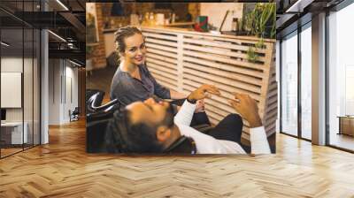 Man and woman having their hair washed at beauty salon. High quality photo Wall mural