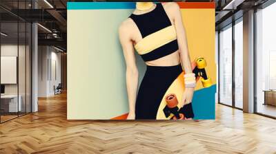 Fashion model with skateboard on bright exclusive background Wall mural