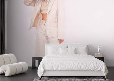 Fashion Urban Girl.  Stylish Details of everyday look. Casual beige outfit and accessories. Trendy Minimalistic style aesthetics. Wall mural