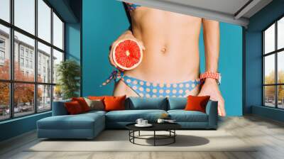 Girl with grapefruit. Citrus Energy Party fashion style Wall mural