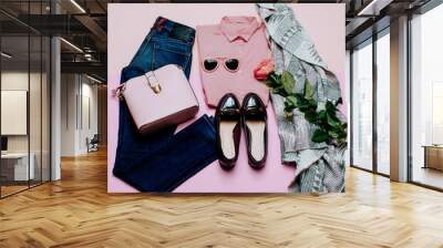 Romantic clothes set. City casual fashion. Spring and Flowers. Stylish accessories. Pink shirt. Jeans. Bag. Bijouterie for Lady Wall mural