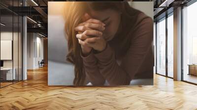 Christian woman praying for god blessing. Wall mural