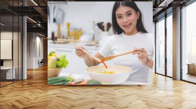 Eat healthy food for good wellness health concept. Woman cooking salad menu with fresh organic vegetables Wall mural