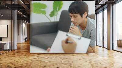 Man counseling with a doctor to rehab mental health after-work stress. Wall mural