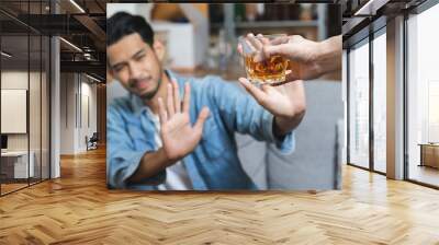 Stop alcohol concept. Person refuse to drink alcohol. Wall mural