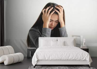 Suffer from depression , mental health problem. Lonely asian young woman sitting on the bed feeling loneliness. Wall mural