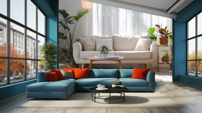 Bright living room with white sofa, coffee table and potted plants. Wall mural