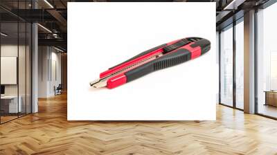 Red and black knife cutter isolated on white Wall mural