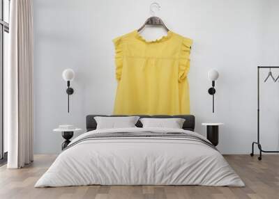 Yellow Blouse on white background. Wall mural