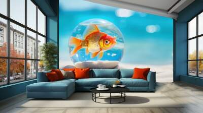 Gold fish with fishbowl on white sand dune in front of beautiful azure sea on a sunny day,soft light, bokeh blue sea background,beach concept,copy space. Wall mural