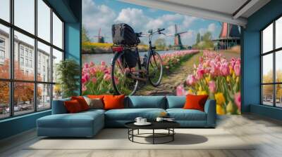 a bicycle tour along a picturesque dutch path lined with vibrant tulip fields and historic windmills Wall mural