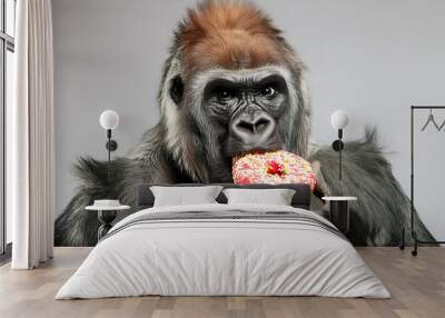 Primate Delight: Gorilla Indulging in Doughnuts Wall mural