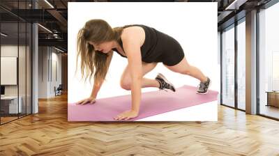 woman fitness black tank push up knee up Wall mural