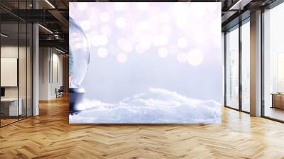 Snow globe on festive background Wall mural