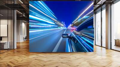 Blurred urban look of the car movement nights longexposure shot with cold colors Wall mural