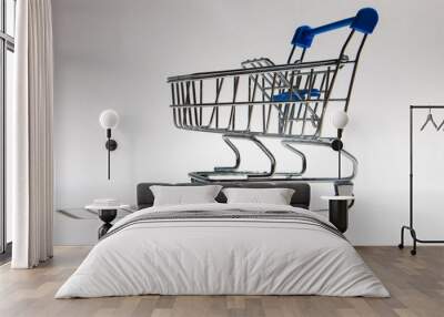 Empty shopping trolley isolated on white, closeup Wall mural