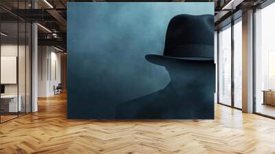 A mysterious figure in a dark hat shrouded in fog, creating an enigmatic and haunting atmosphere. Wall mural