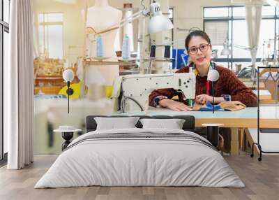 confident woman employee looking at camera Wall mural