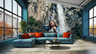 female backpacker visit bridal veil falls Wall mural