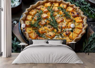 Golden butternut squash and goat cheese pie with rustic crust and fresh herbs Wall mural