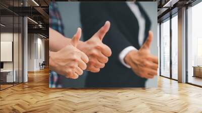 Group of Business people giving thumb up after sucess deal with team. The gesture of businesswoman and businessman thumbs-Up Standing With Happy corporate Employees and Teamwork Wall mural