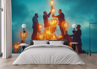 Teamwork and collaboration leading to success, symbolized by people holding light bulbs. Wall mural