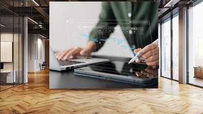 concept of time management and human resources Effectively, businesswoman using a laptop and tablet computer Organizing work in a systematic way. Wall mural