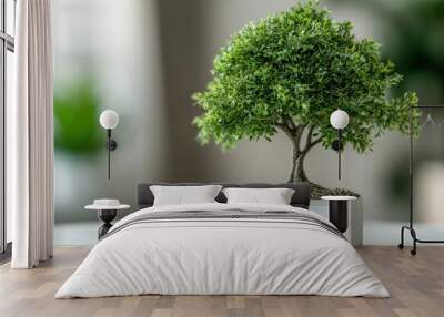 A small decorative tree symbolizing ESG investment, placed on a table with a blurred background, highlighting sustainable finance and environmental responsibility. Wall mural