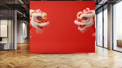 Two vibrant lion dance heads on a red background, symbolizing celebration and tradition. Wall mural