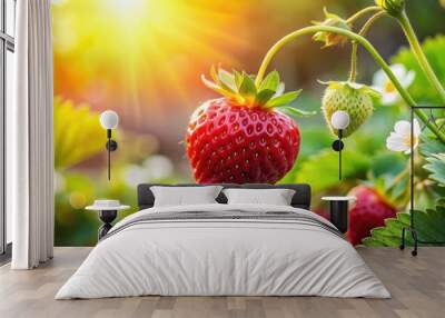 Vibrant closeup of a strawberry blooming under the sun in a beautiful garden Wall mural