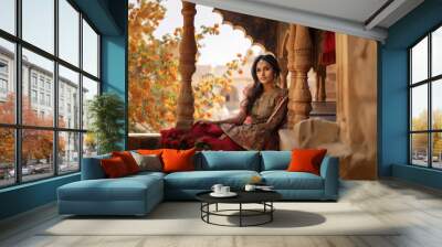 Beautiful indian woman or princess in traditional wear and jwellery Wall mural