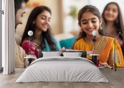 happy indian family holding sweet box together on diwali Wall mural