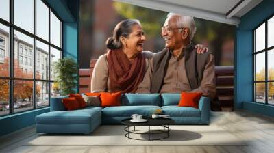 Happy indian senior couple enjoying at park Wall mural