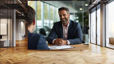 Indian businessman being interviewed at his new car dealership Wall mural