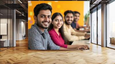 indian corporate office staff smiling while working at office Wall mural