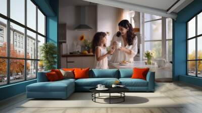 indian mother and daughter drinking milk at home Wall mural