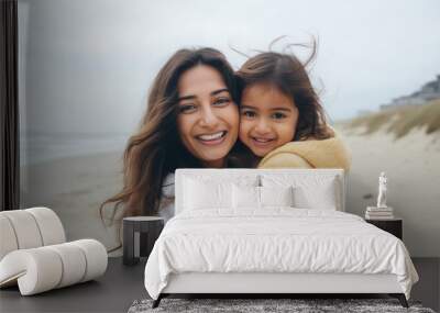 indian woman and her little girl child smiling Wall mural