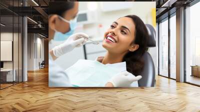 indian young woman getting dental treatment Wall mural