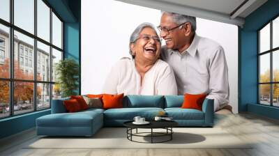 Senior indian couple giving happy expression. Wall mural