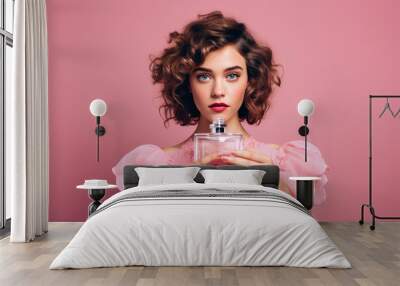 Young beautiful woman with skin care product bottle Wall mural