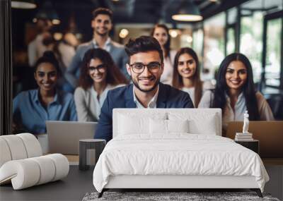 Young businesspeople or corporate employee group giving happy expression at office Wall mural