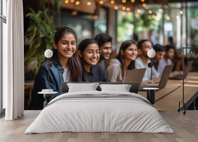 Young businesspeople or corporate employee group giving happy expression at office Wall mural