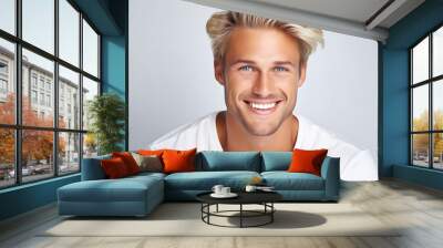 a closeup photo portrait of a handsome blonde scandinavian man smiling with clean teeth. for a dental ad. guy with fresh stylish hair with strong jawline. isolated on white background. Wall mural