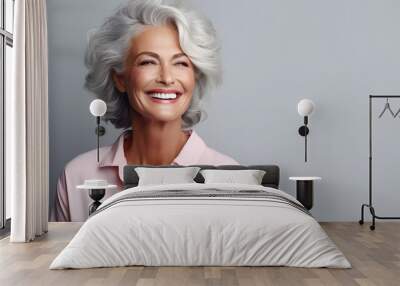 Beautiful gorgeous 50s mid age beautiful elderly senior model woman with grey hair laughing and smiling. Mature old lady close up portrait. Healthy face skin care beauty, skincare cosmetics, dental. Wall mural