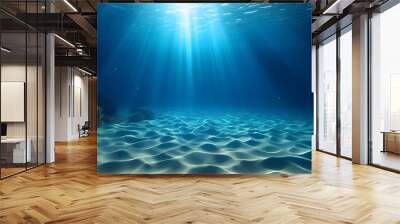 Empty blue underwater with sunlight shine to sand sea floor, deep ocean. Wall mural