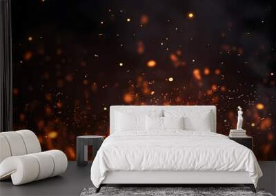 Fire embers particles over black background. Fire sparks background. Abstract dark glitter fire particles lights. Wall mural