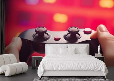 Gamer playing video game console with game controller Wall mural